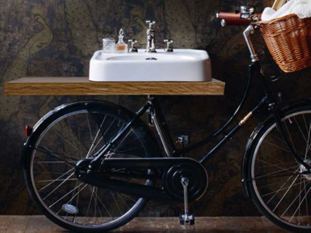 This made in England Pashley bicycle has a bathroom sink in the place of a saddle