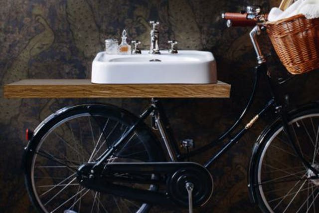 This made in England Pashley bicycle has a bathroom sink in the place of a saddle