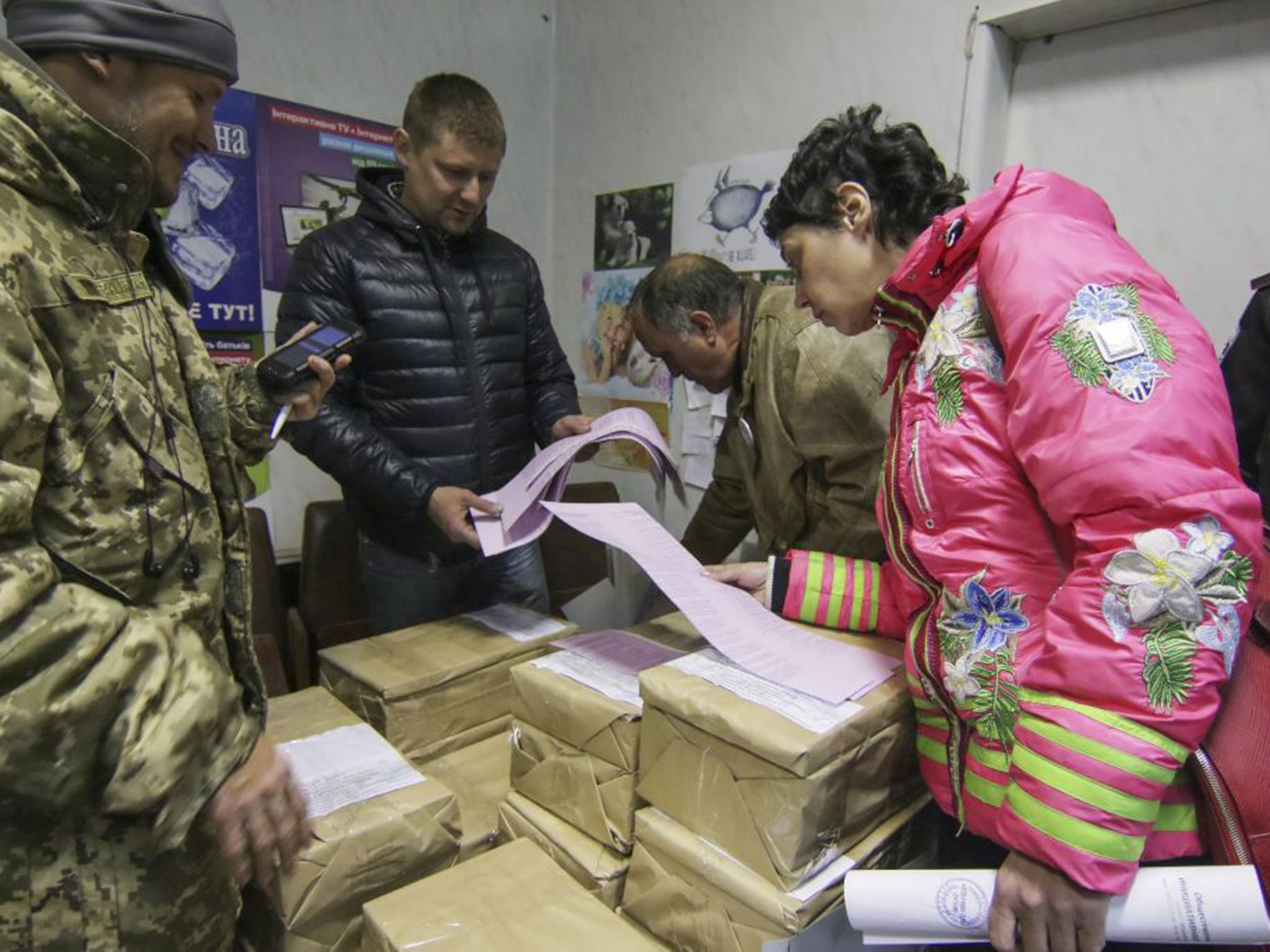 Mariupol activists check ballots at the plant owned by Rinat Akhmetov