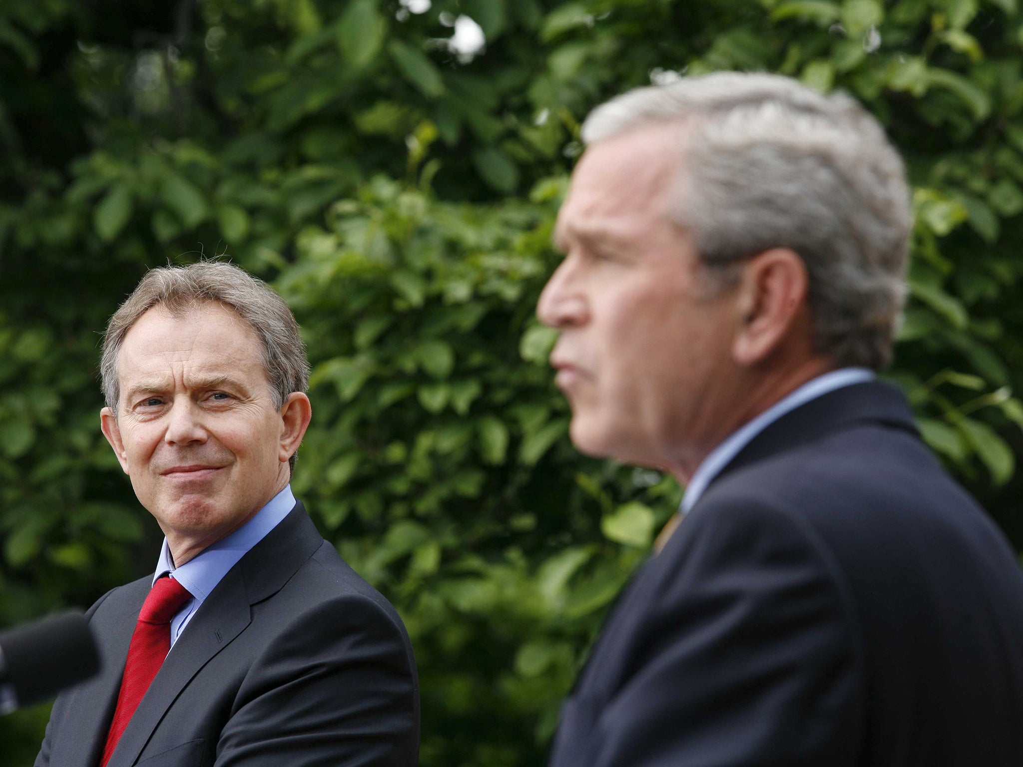 Tony Blair holding a joint press conference with President George W. Bush in the Rose Garden of the White House, his final visit before he resigned in June 2007
