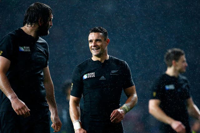 New Zealand fly-half Dan Carter smiles after beating South Africa 20-18