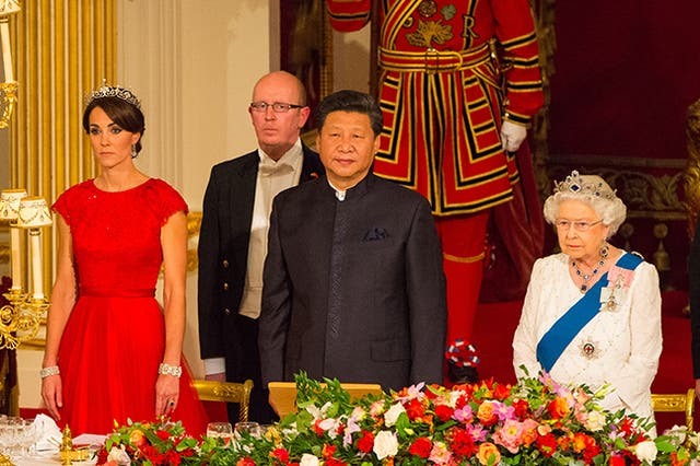 The Duchess of Cambridge, President of China Xi Jinping, and Britain's Queen Elizabeth II attend a state banquet at Buckingham Palace on October 20, 2015 in London