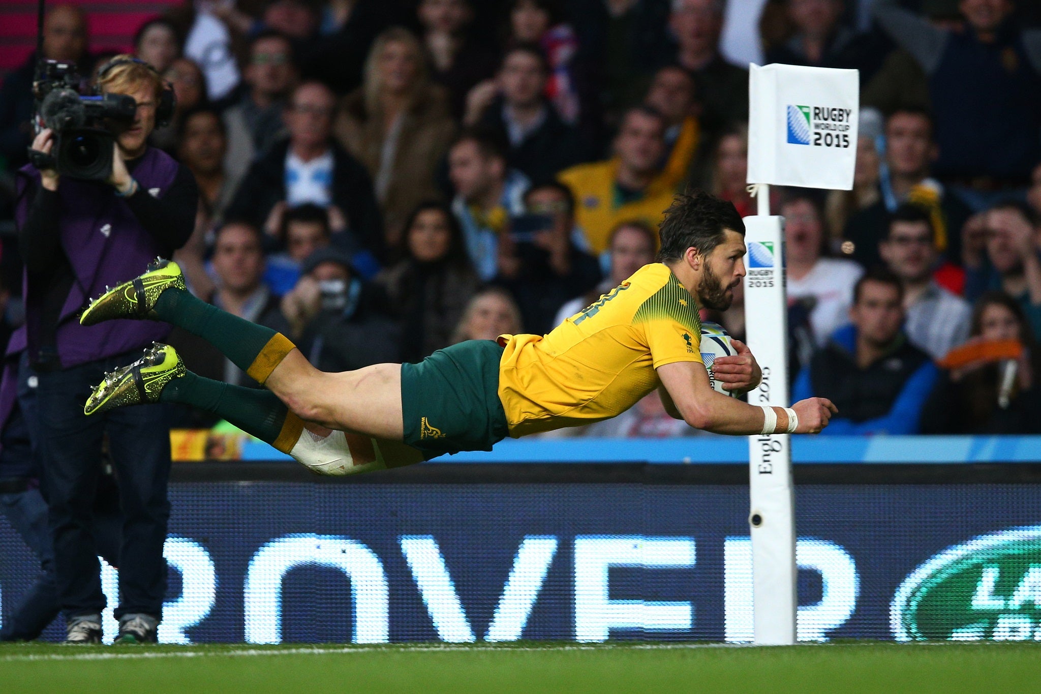Adam Ashley-Cooper dives over for the second of his three tries