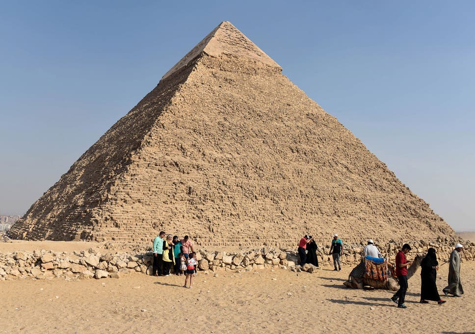 Tourists visit the Giza                pyramids, on the southern outskirts of the Egyptian                capital, Cairo