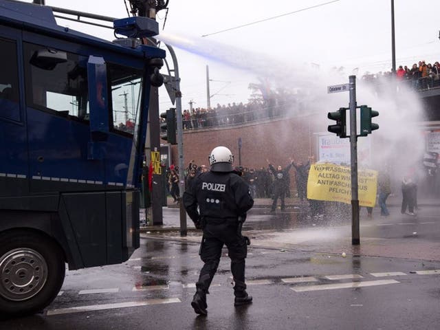 Police use water cannon against counter demonstrators protesting a Hogesa demonstration in Cologne, Germany, 25 October 2015. The Hooligans gegen Salafisten (Hogesa, Hooligans against Salafists) group is holding a demonstration in Cologne, while several counter demonstrations and events are also planned. In total, police are expecting up to 23,000 demonstrators.