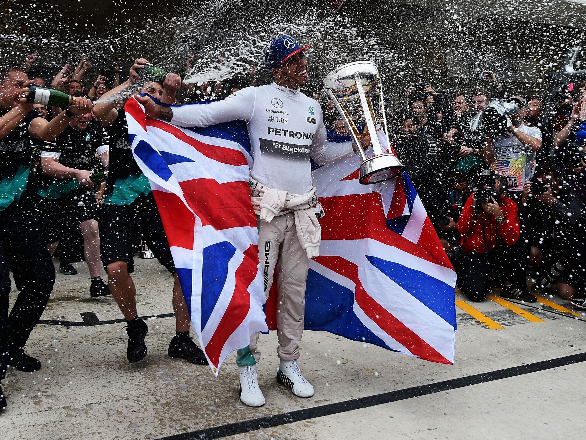 Lewis Hamilton celebrates winning the 2015 F1 world championship