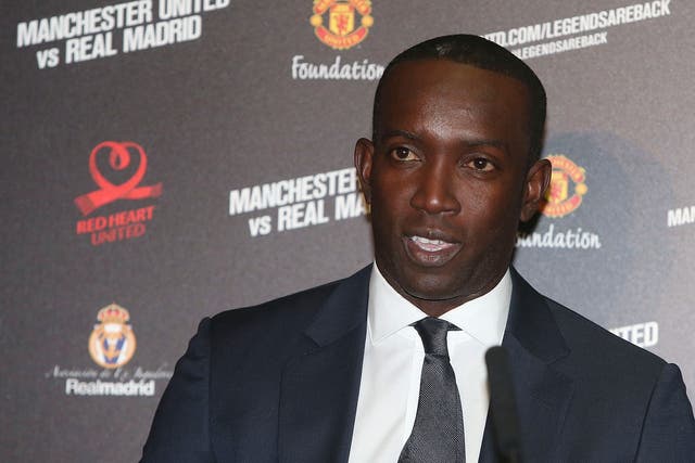 Dwight Yorke says his colour has prevented him from becoming a manager