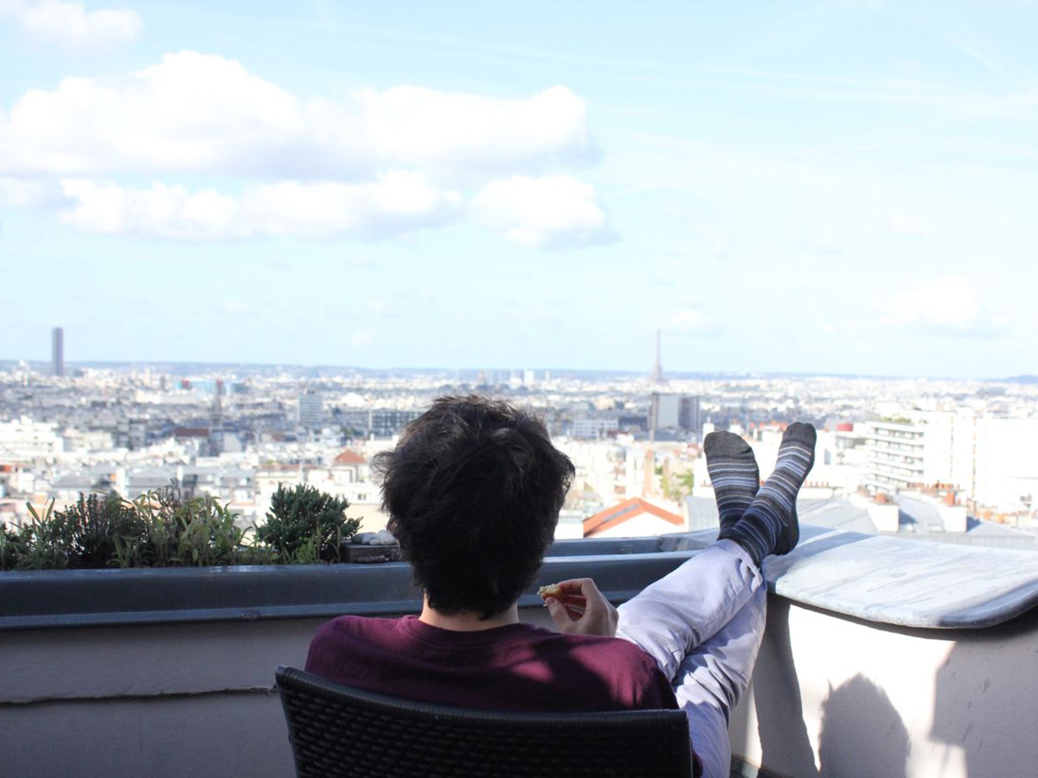 Greg Dickinson enjoys the Paris skyline from his Airbnb apartment