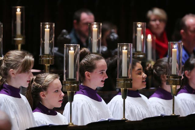 Canterbury Cathedral Girls Choir sing in their first ever performance during Evensong at Canterbury Cathedral. In January last year they made history as the first all-girls' choir to give a public performance after more than 1,000 years of male-dominated singing