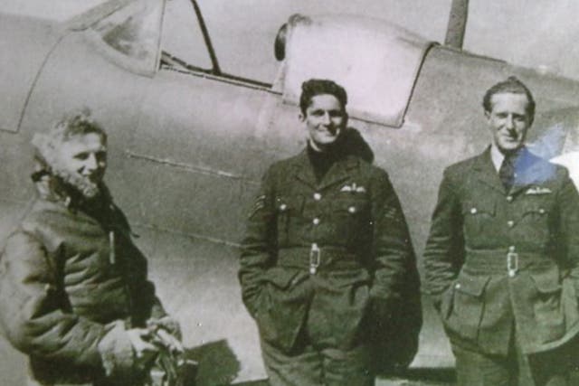 A quieter character than many of his fellow aces: Wright, far left, on the airfield