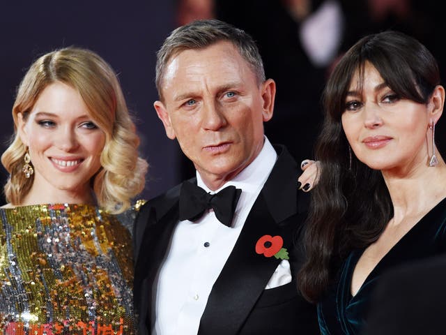 Daniel Craig with his co-stars Lea Seydoux, left, and Monica Bellucci, at the Spectre film premiere