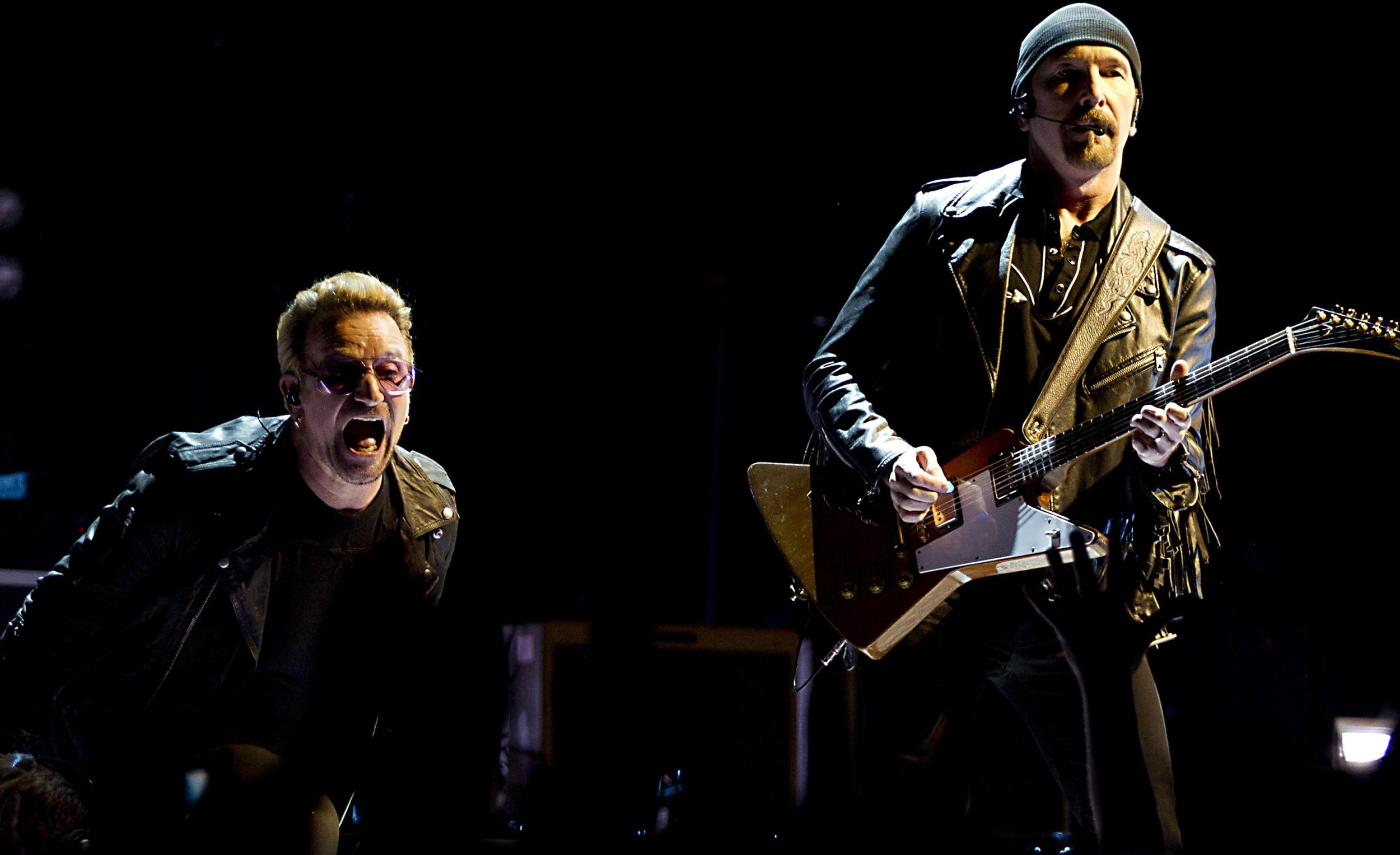 U2 performing on their Innocence + Experience tour