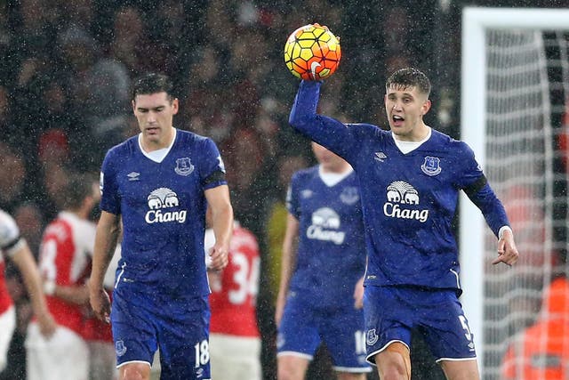 Everton's Gareth Barry and John Stones cast frustrated figures after conceding to Arsenal