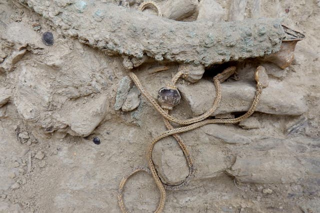 A long gold chain, decorated with semi-precious stones, was found in a 3,500-year-old warrior’s tomb