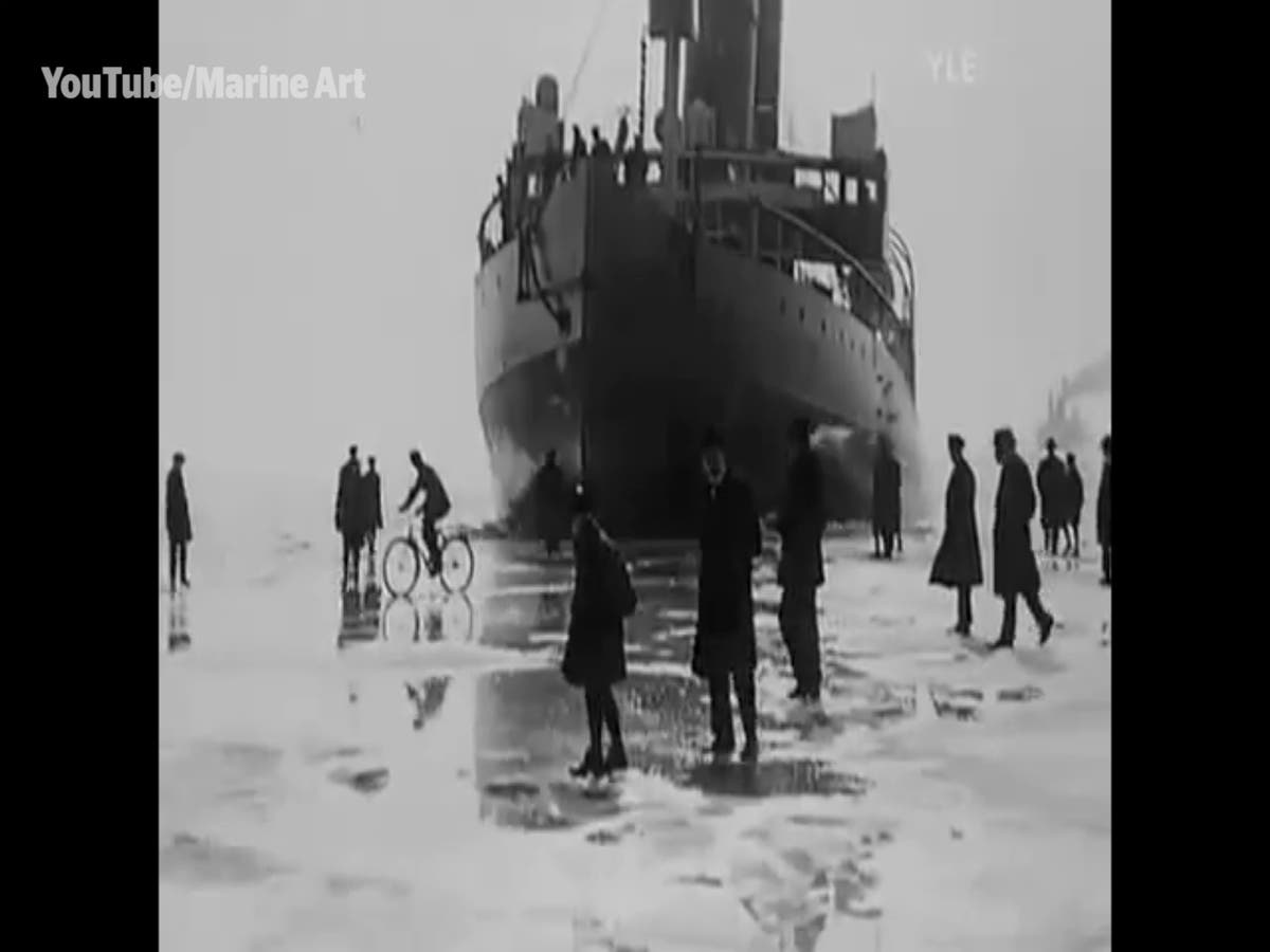 Video from 1920s shows crowd play chicken with huge ice breaker in Finland, The Independent