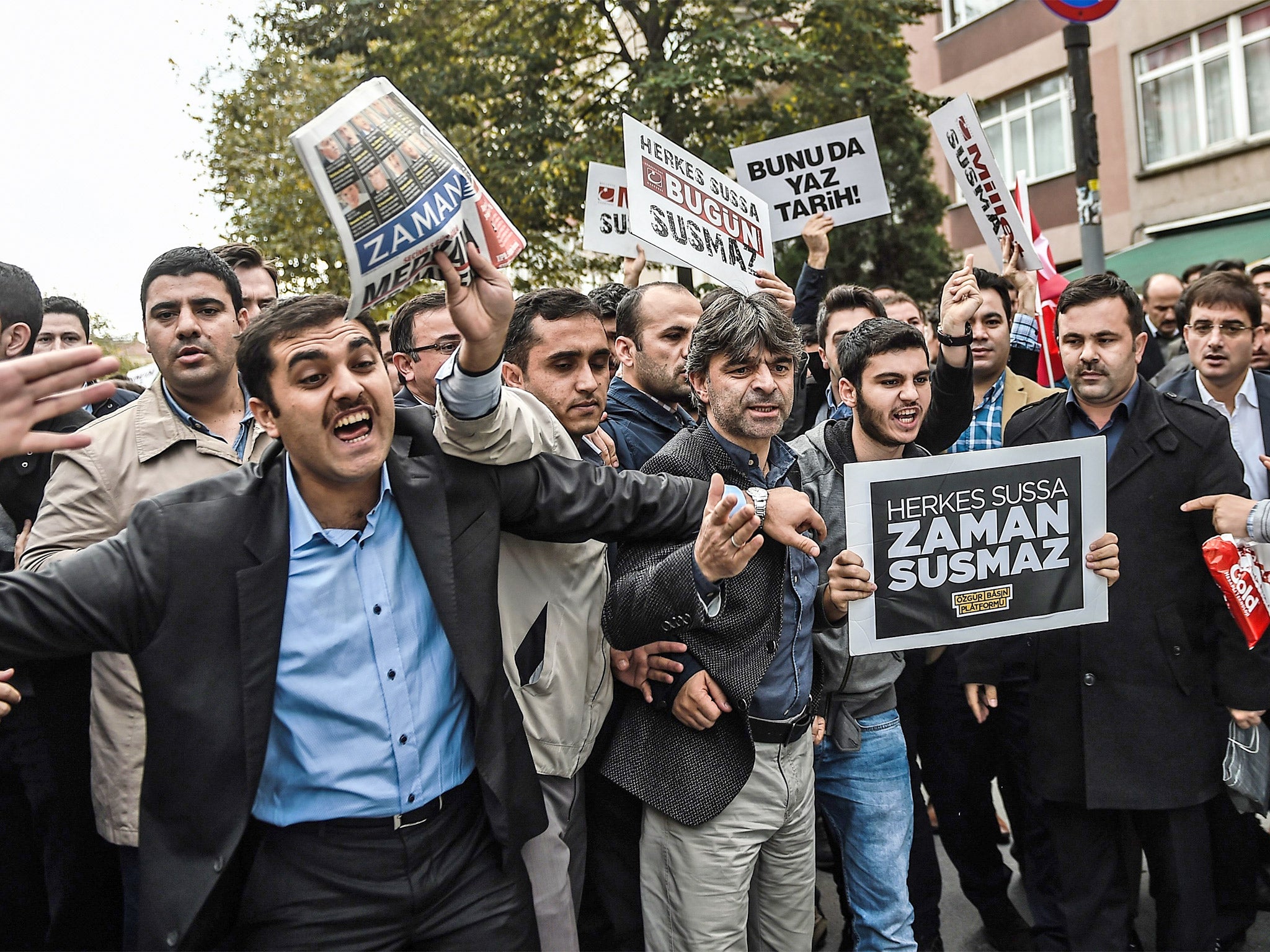 Tempers flare at a protest against the Turkish government's crackdown on media outlets, in Istanbul (Getty)