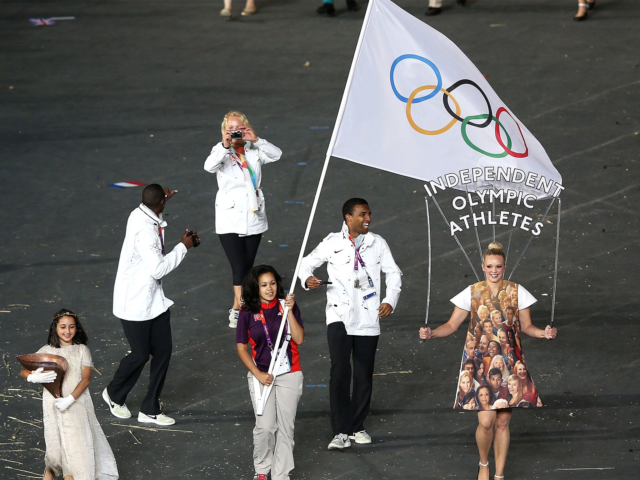 Independent athletes enter the stadium under the Olympic flag during the opening ceremony for London 2012