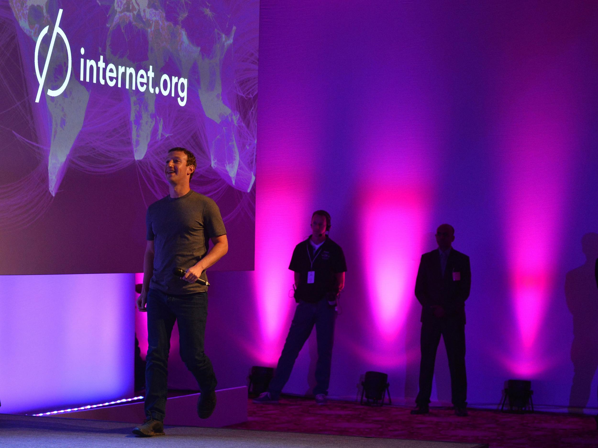US chairman and chief executive of Facebook Mark Zuckerberg walks on stage to announce the Internet.org Innovation Challenge in India in New Delhi on October 9, 2014