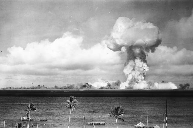 A mushroom cloud forms after the first nuclear test off Bikini Atoll in July 1946