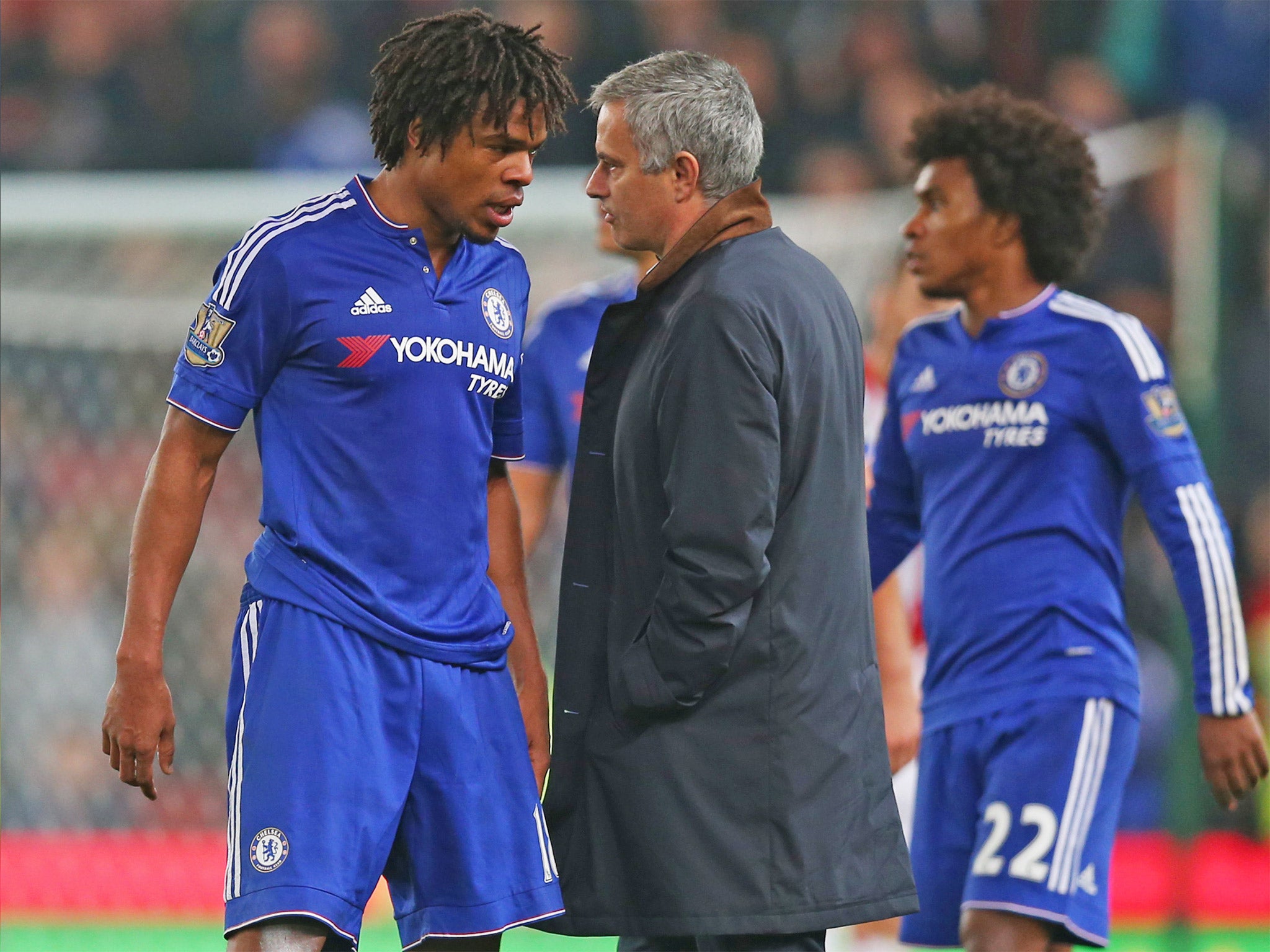 Chelsea striker Loic Remy speaking with his manager on Tuesday night