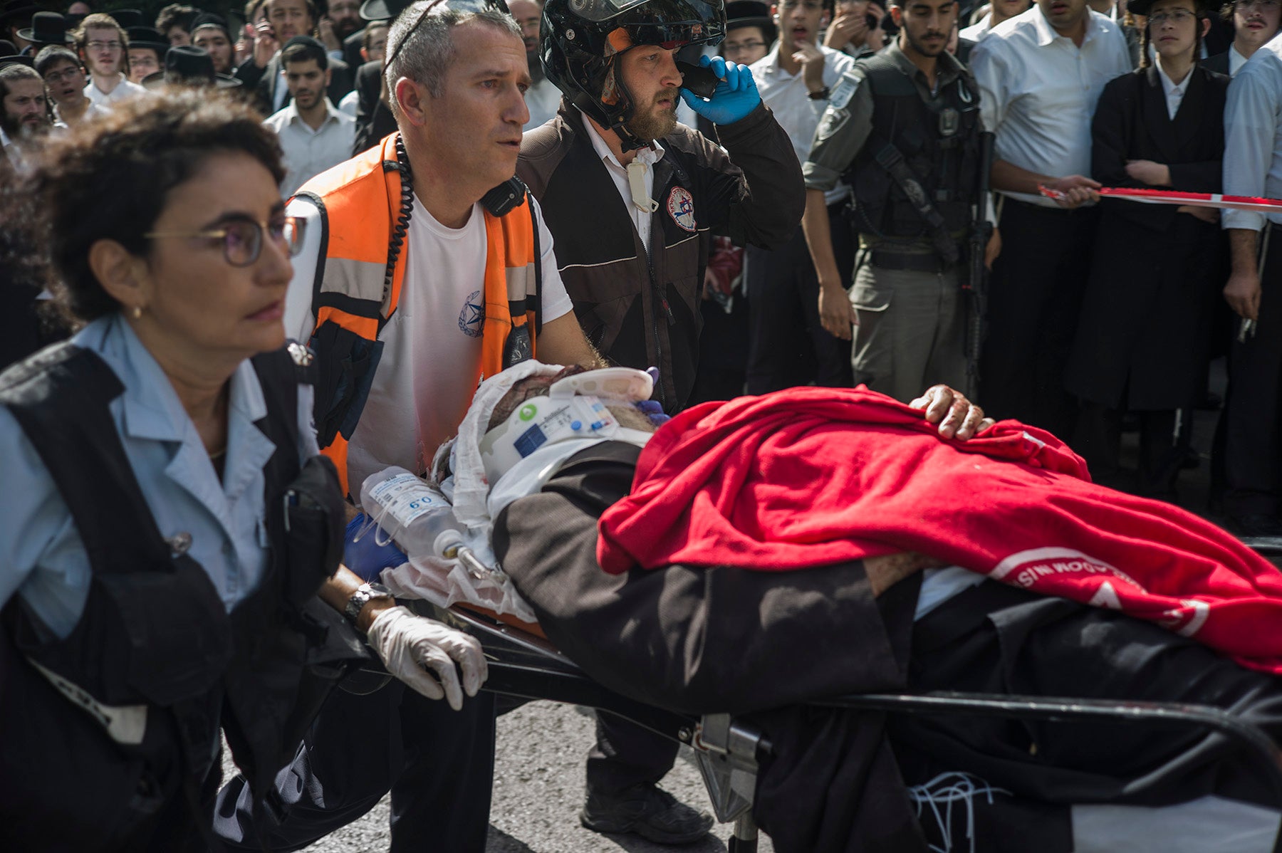 Medics attend the scene of a stabbing in Jerusalem in October 2015