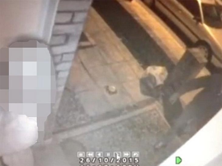 CCTV footage showing the woman on her doorstep and the man approaching from behind