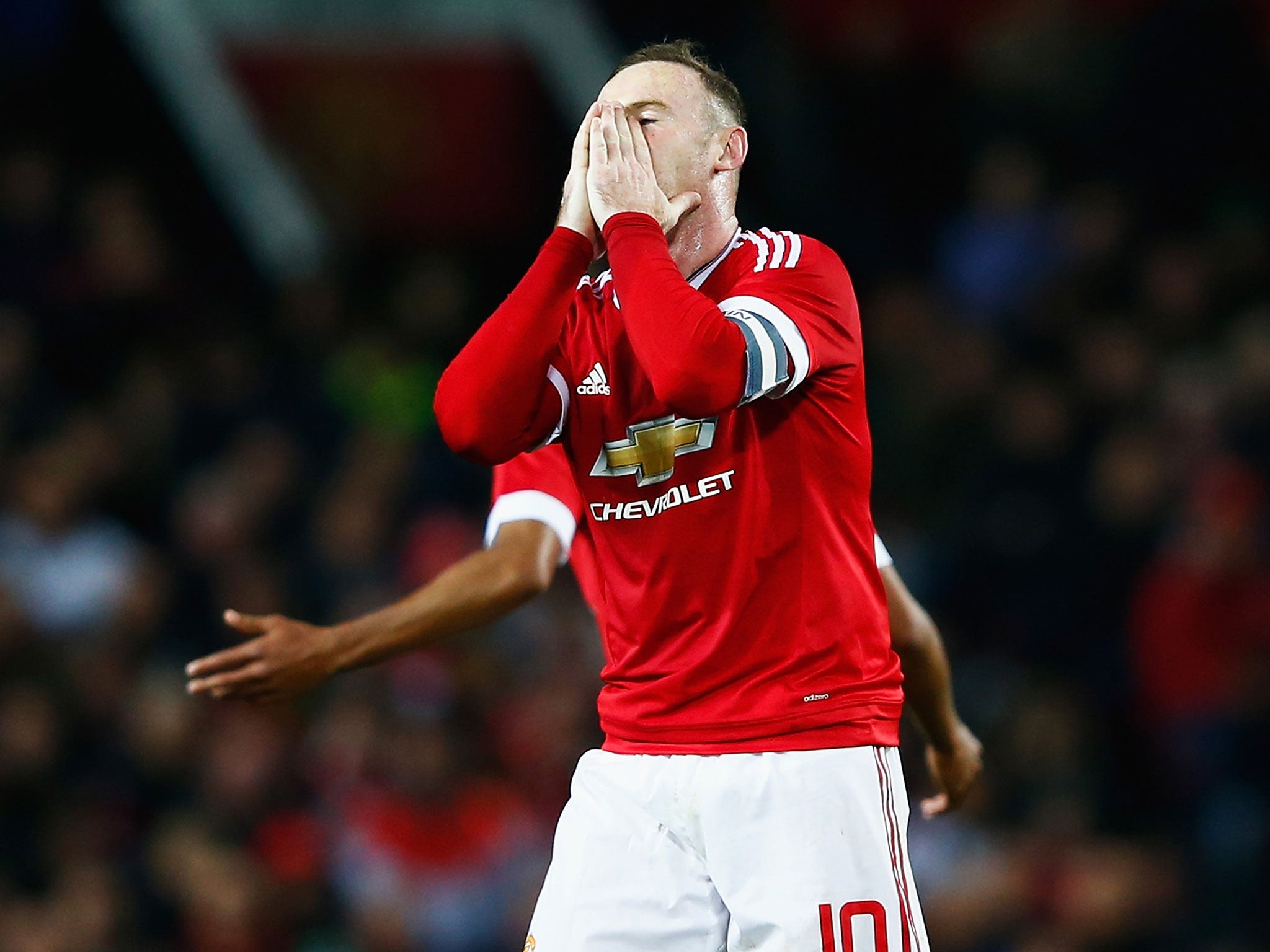 Wayne Rooney reacts after missing a chance for Manchester United