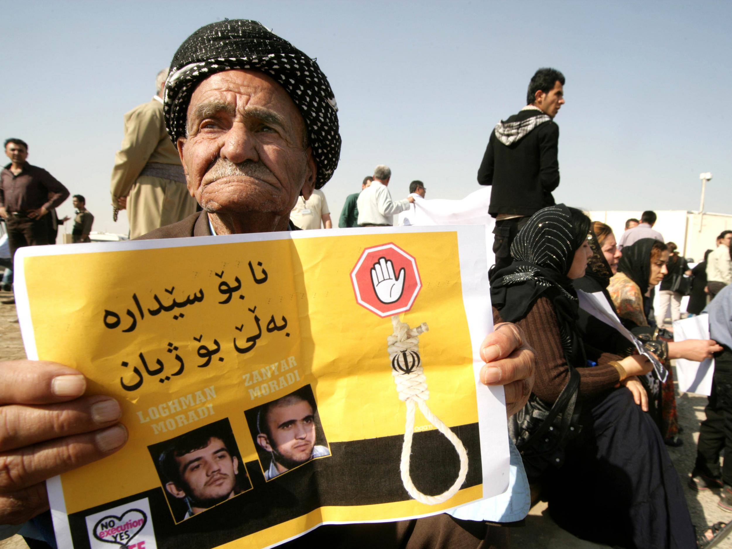 Iranian-Kurds protest against the execution of Kurdish rebels in Iran, in the northern Iraqi Kurdish city of Arbil