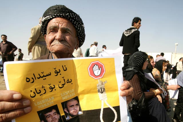 Iranian-Kurds protest against the execution of Kurdish rebels in Iran, in the northern Iraqi Kurdish city of Arbil
