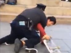 US officer brings down skateboarder with possible 'banned chokehold'