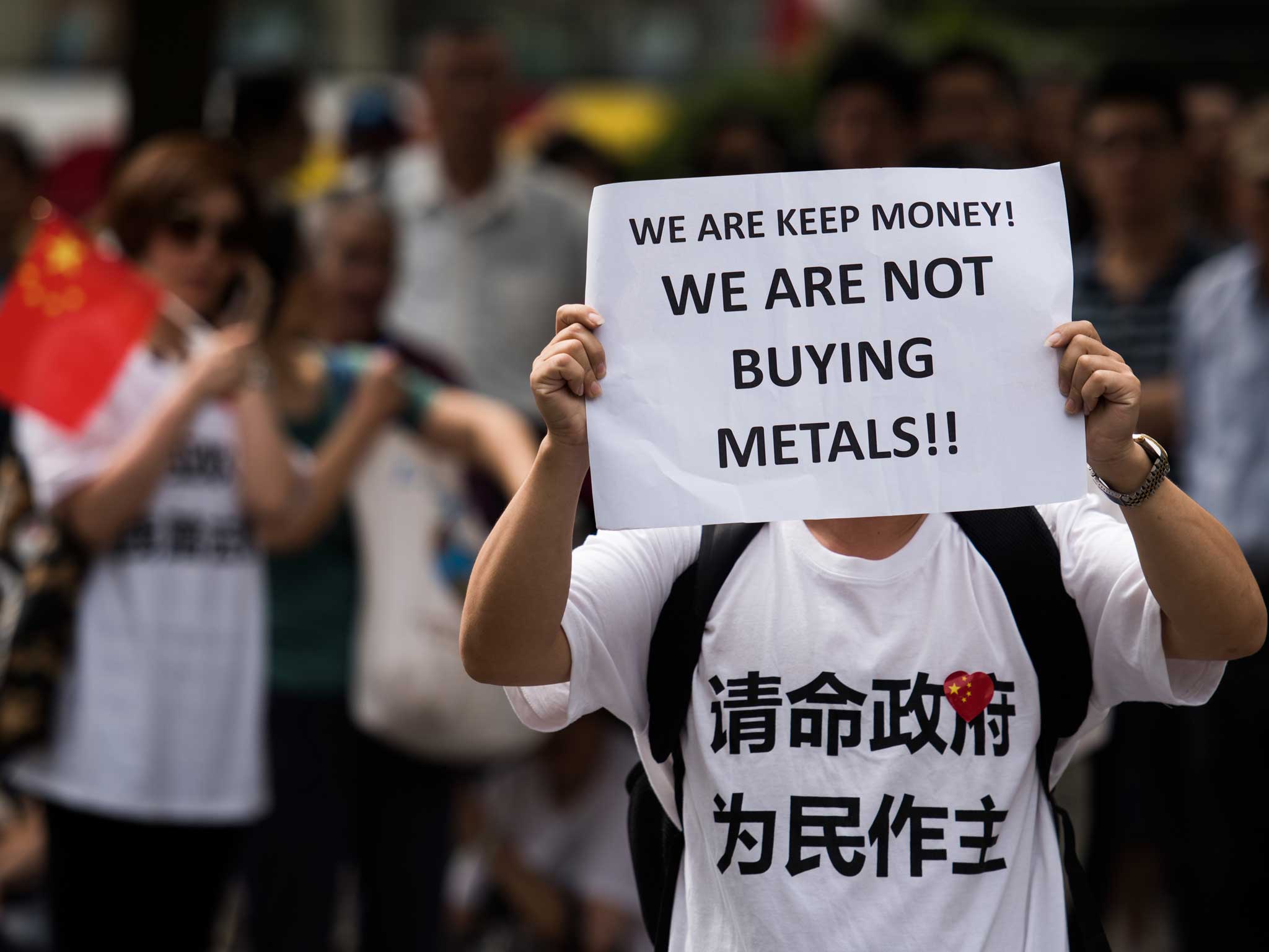 People protest outside the office of the China Insurance Regulatory Commission in Shanghai on September 25, 2015 claiming they were tricked by the Fanya metals exchange. Chinese speculators who claim to have lost money on risky investments mounted a rare protest in Shanghai