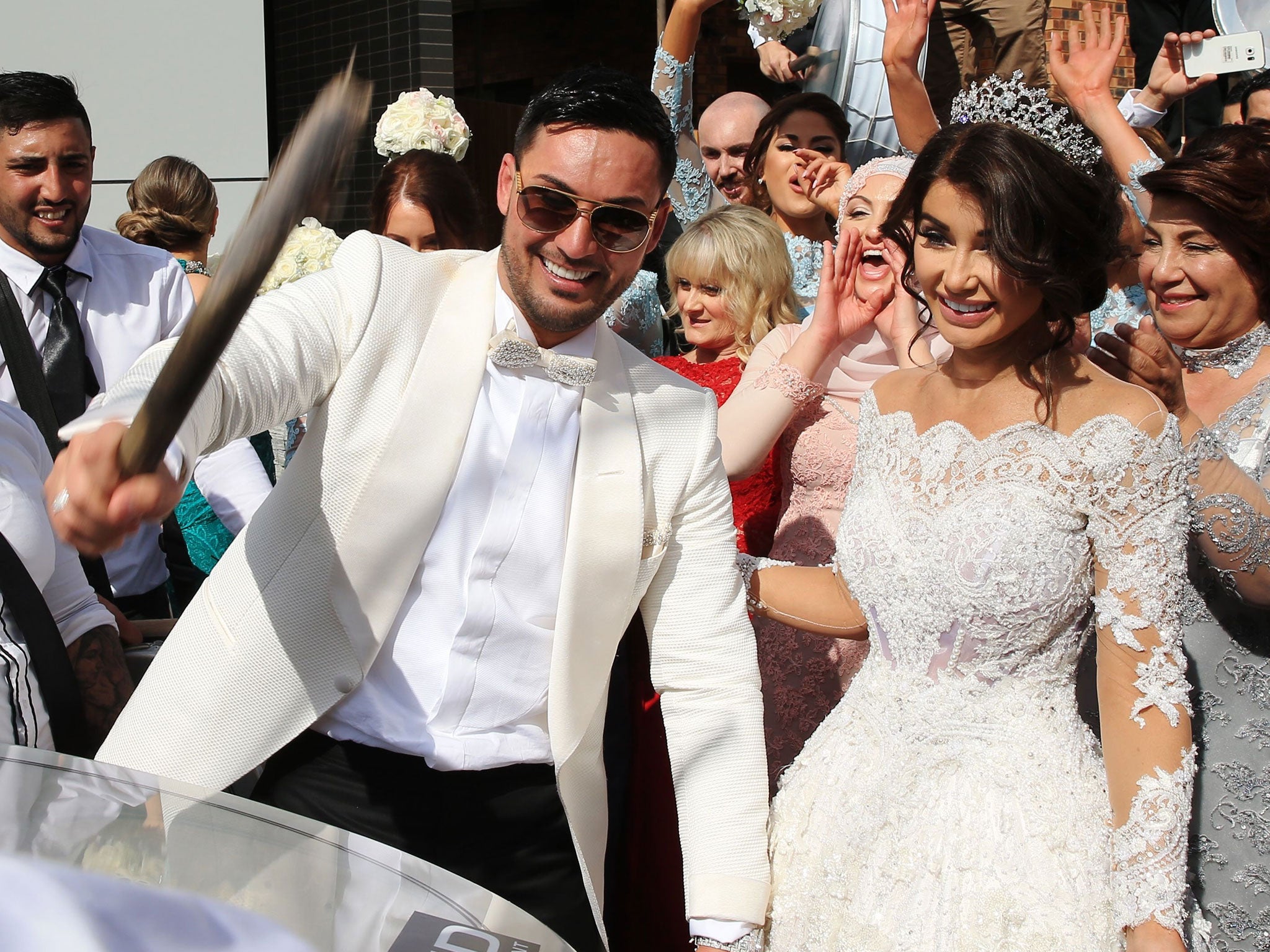 Salim Mehajer and his wife, Aysha, party outside their Sydney home on their lavish wedding day