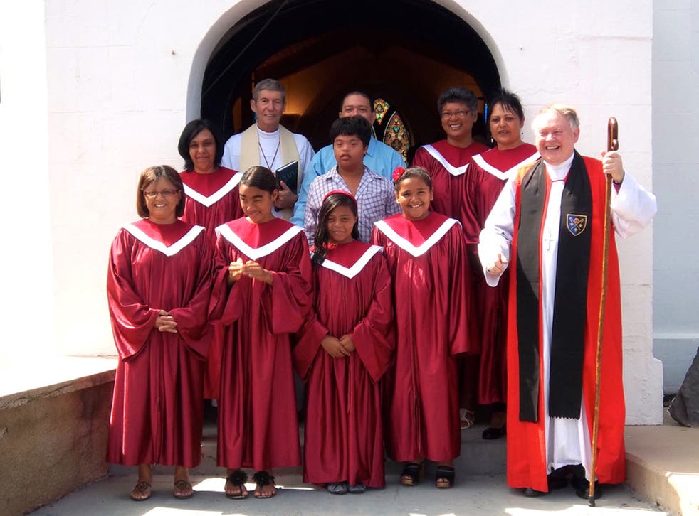 Rt Rev Dr Richard Fenwick, right, with the choir