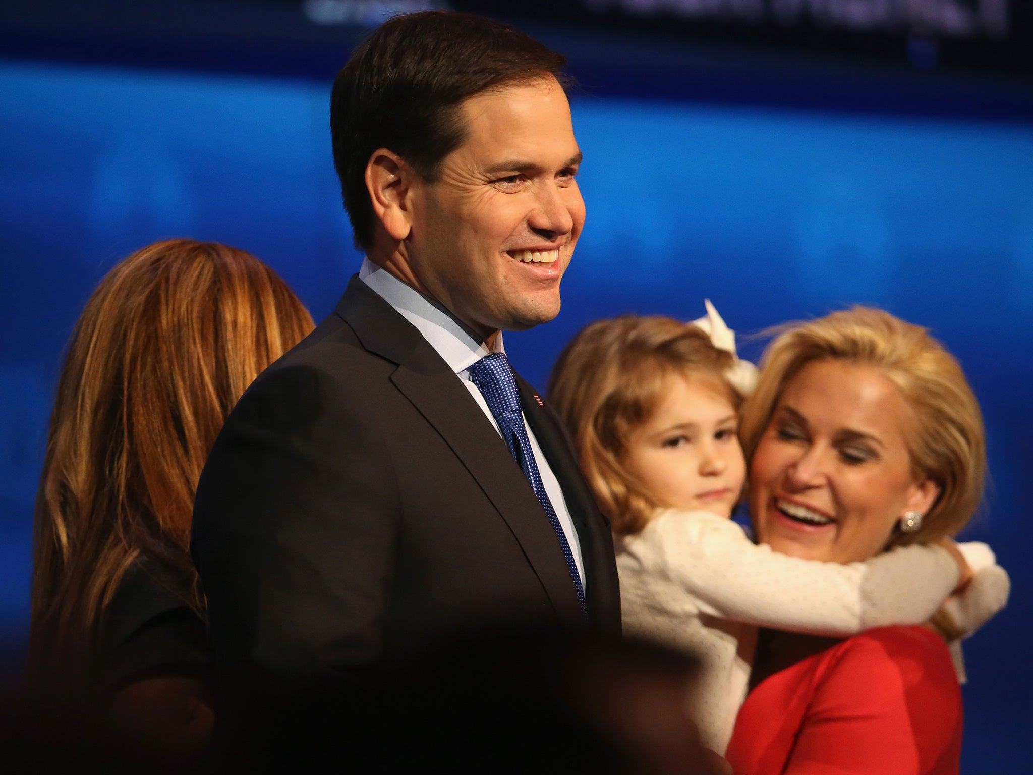 Marco Rubio, pictured on stage with family members, delivered a polished performance in which he took on Jeb Bush