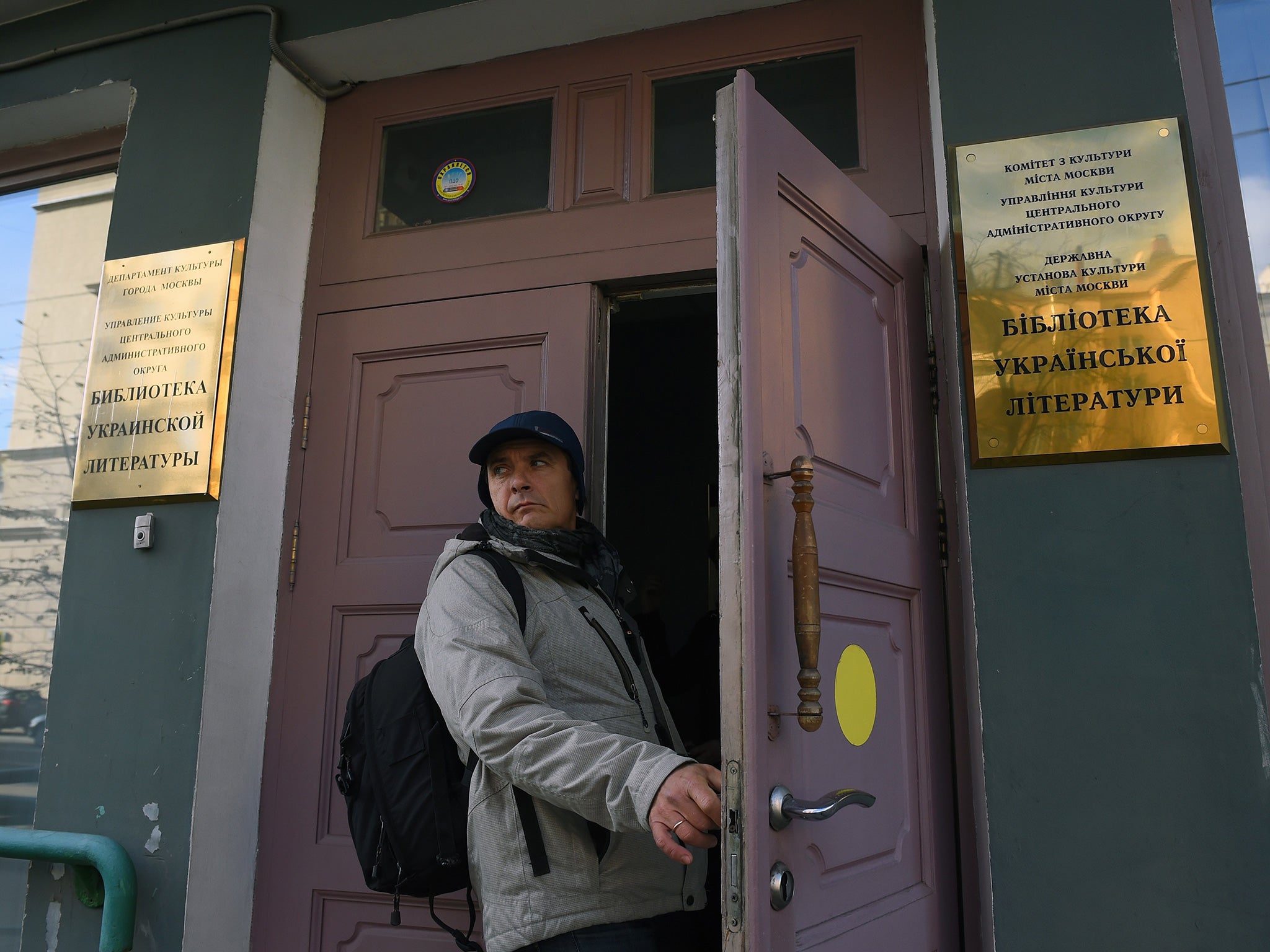 A man enters the library of Ukrainian literature in Moscow