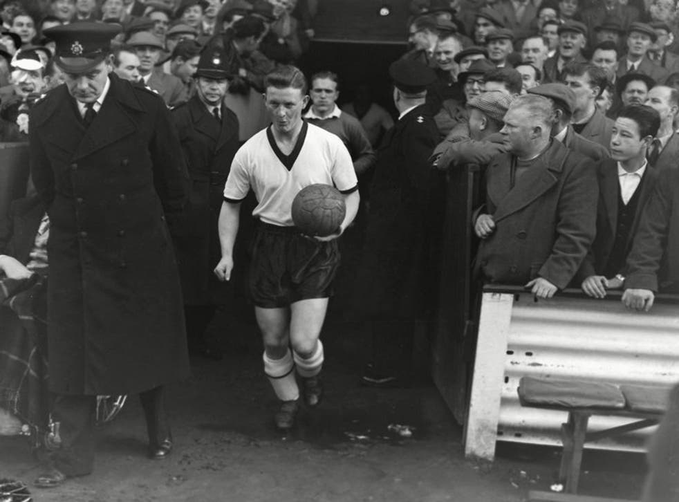Formidable strength: Greener leads out Darlington to face Chelsea in the FA Cup in 1958