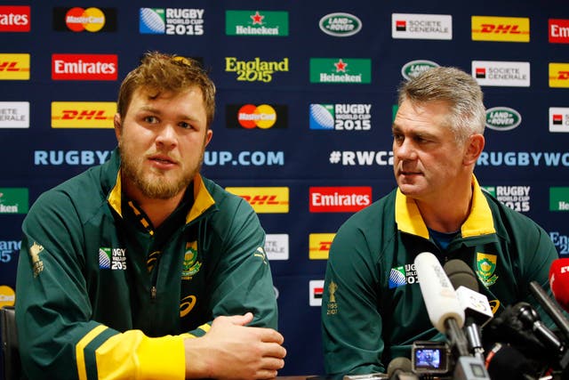 South Africa’s Duane Vermeulen, left, wants Heyneke Meyer, right, to stay on as head coach