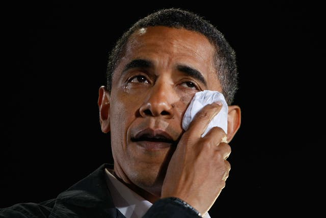 Barack Obama wipes away tears as he cries while speaking about his grandmother during a rally at University of North Carolina on November 3, 2008