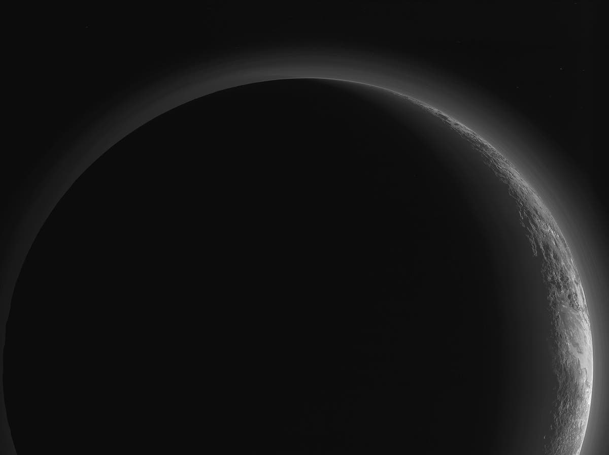 Pluto’s stunning, hazy crescent captured in images from New Horizons ...