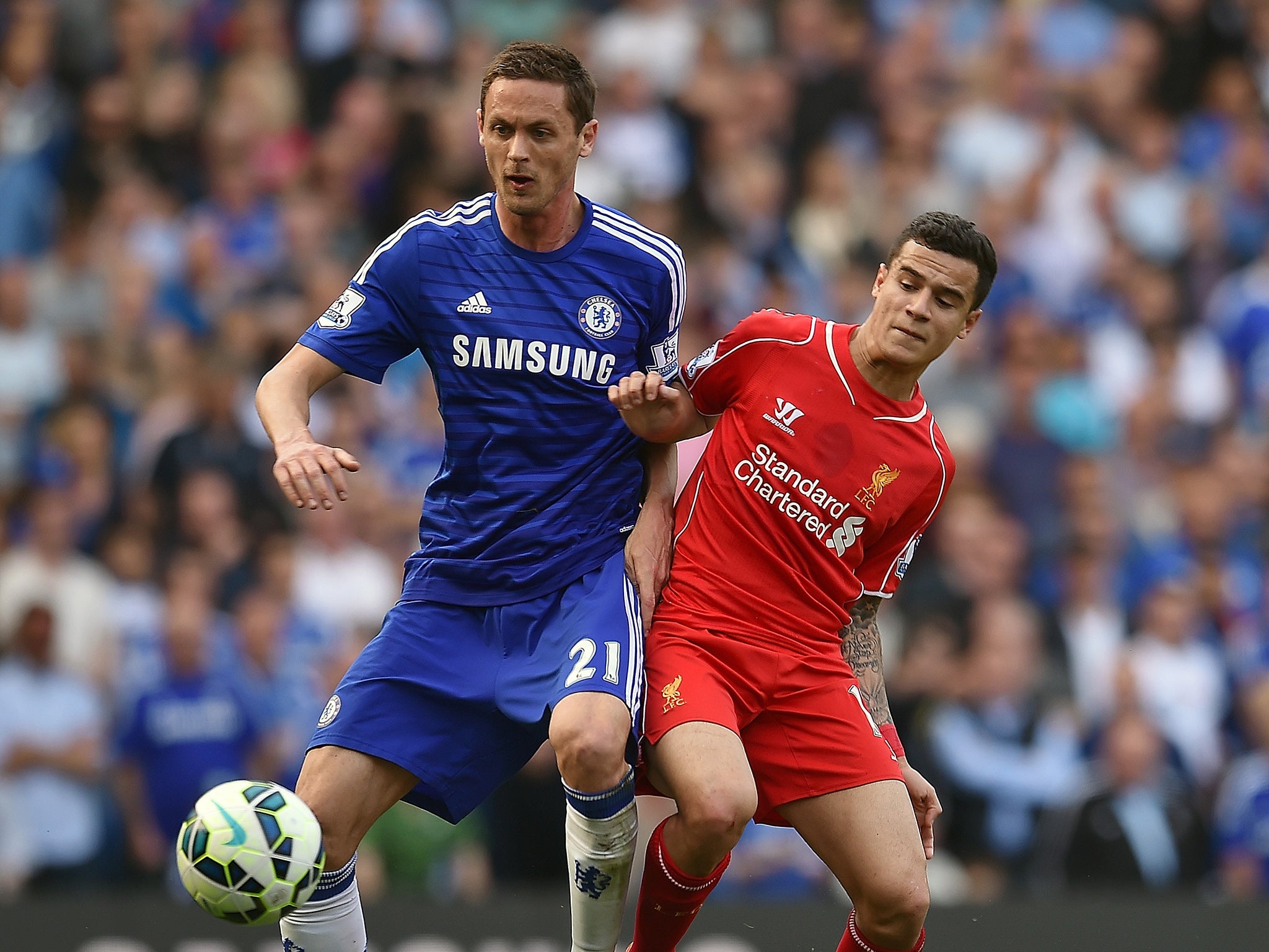 Nemanja Matic and Philippe Coutinho contest for the ball during last season's encounter at Stamford Bridge