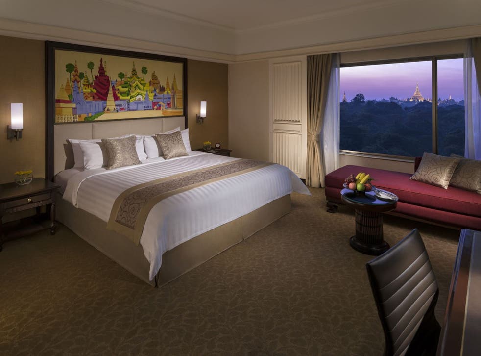 A room at Sule Shangri-La with local art