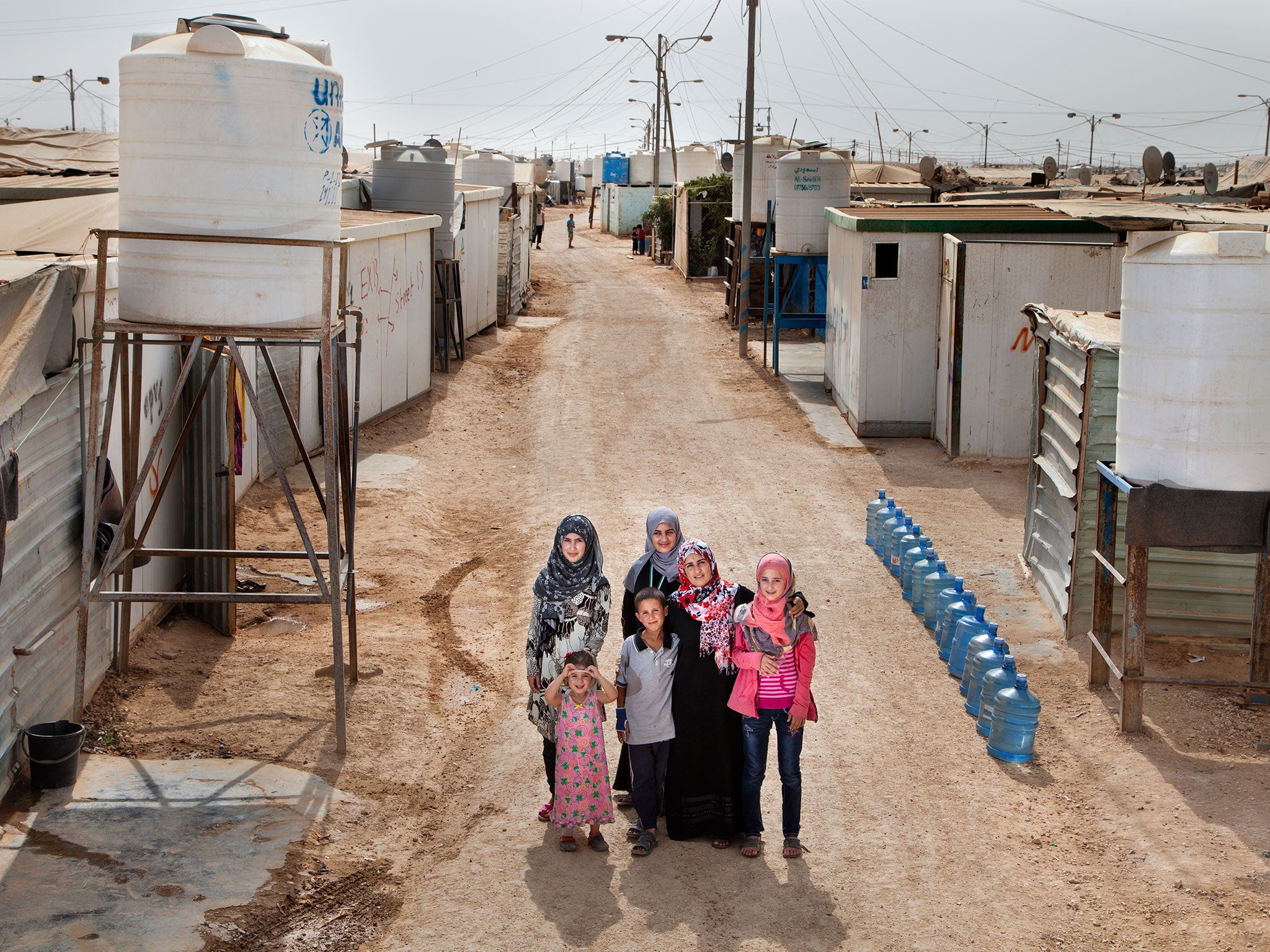 Amal Al Hoshan, a teacher, and her five children live in Zaiatari refugee camp in Jordan