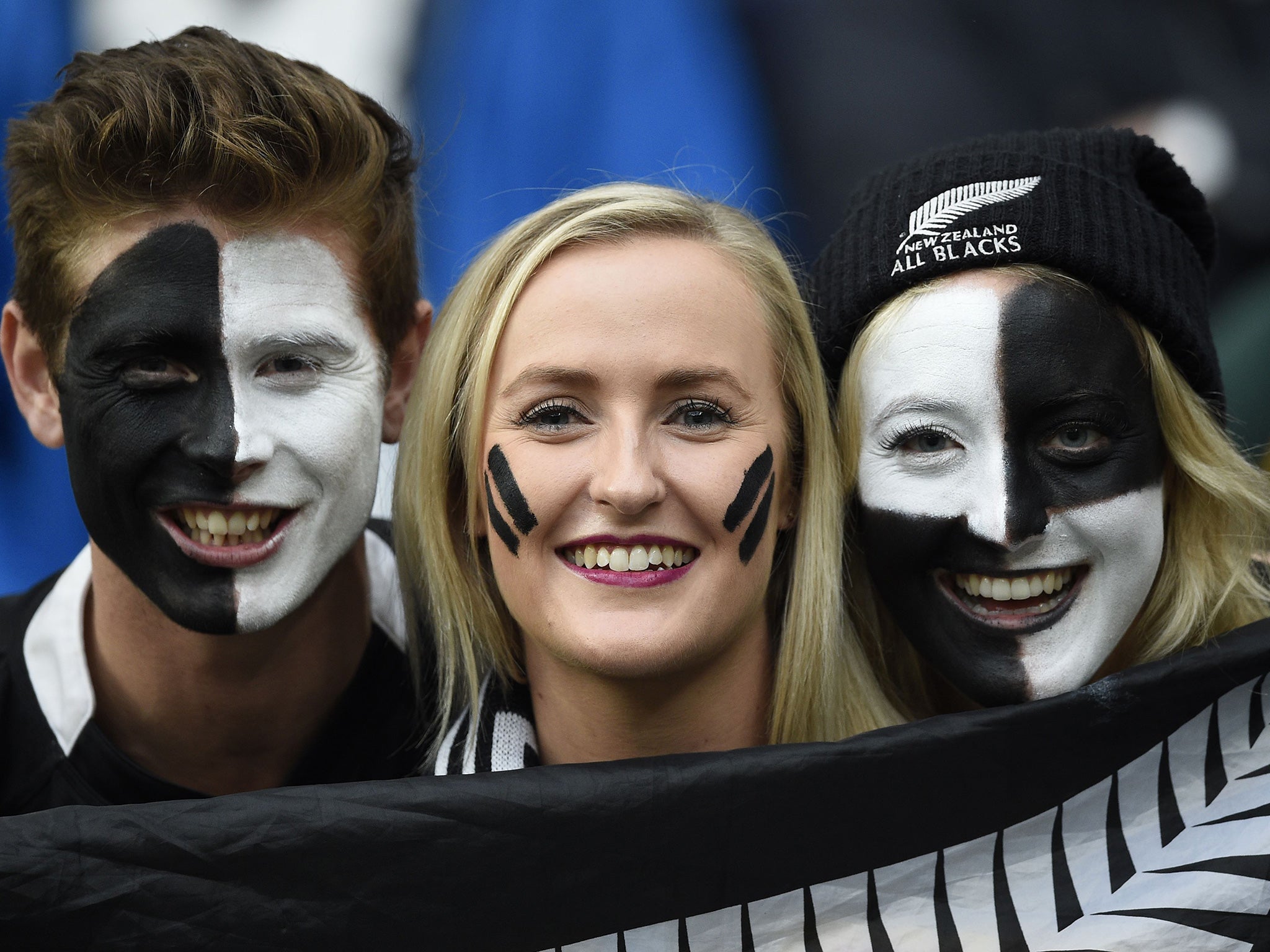 New Zealand fans pose prior to the semi-final against South Africa