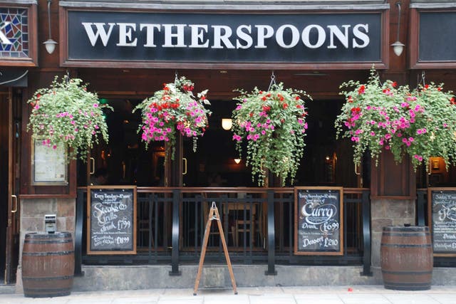  Pub chain JD Wetherspoons' pre-tax profit fell 3.9 per cent to £36m