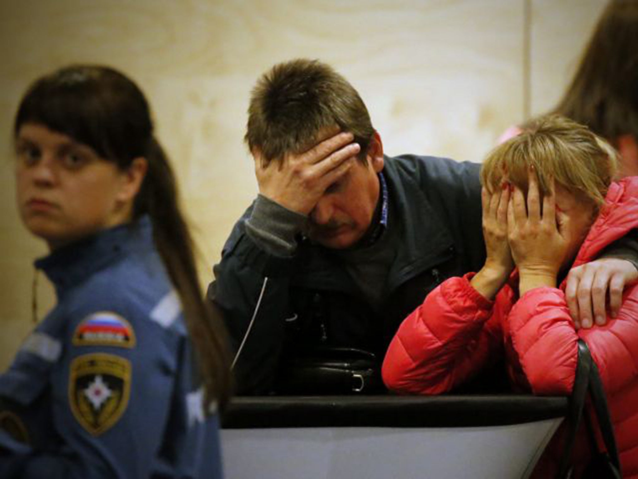 Relatives of passengers of Metrojet flight 9268 are told the news at a hotel in St. Petersburg, Russia. All passengers and crew members on board the Airbus A321 died in the crash