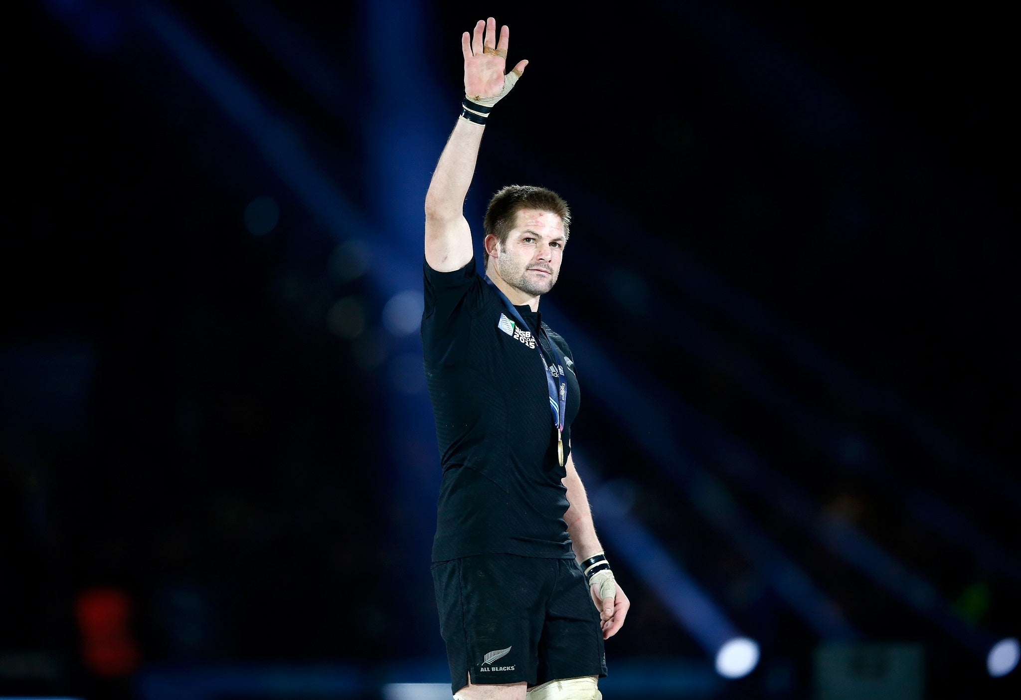 Richie McCaw salutes the crowd after guiding New Zealand to Rugby World Cup glory