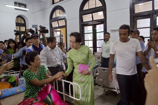 Aung San Suu Kyi at a Rangoon hospital