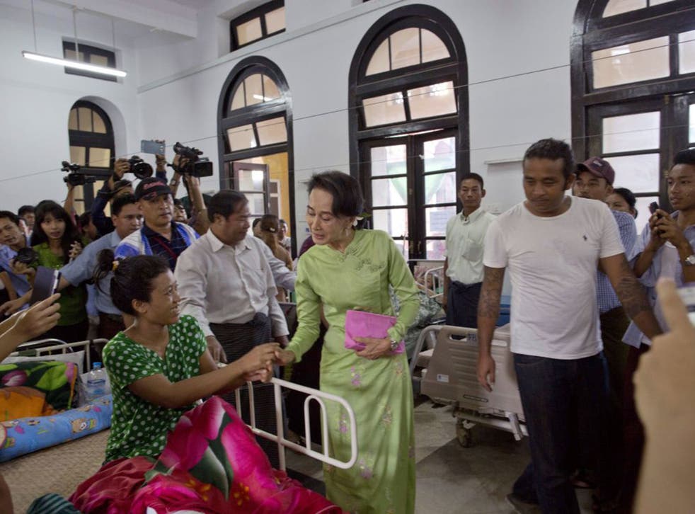 Aung San Suu Kyi at a Rangoon hospital