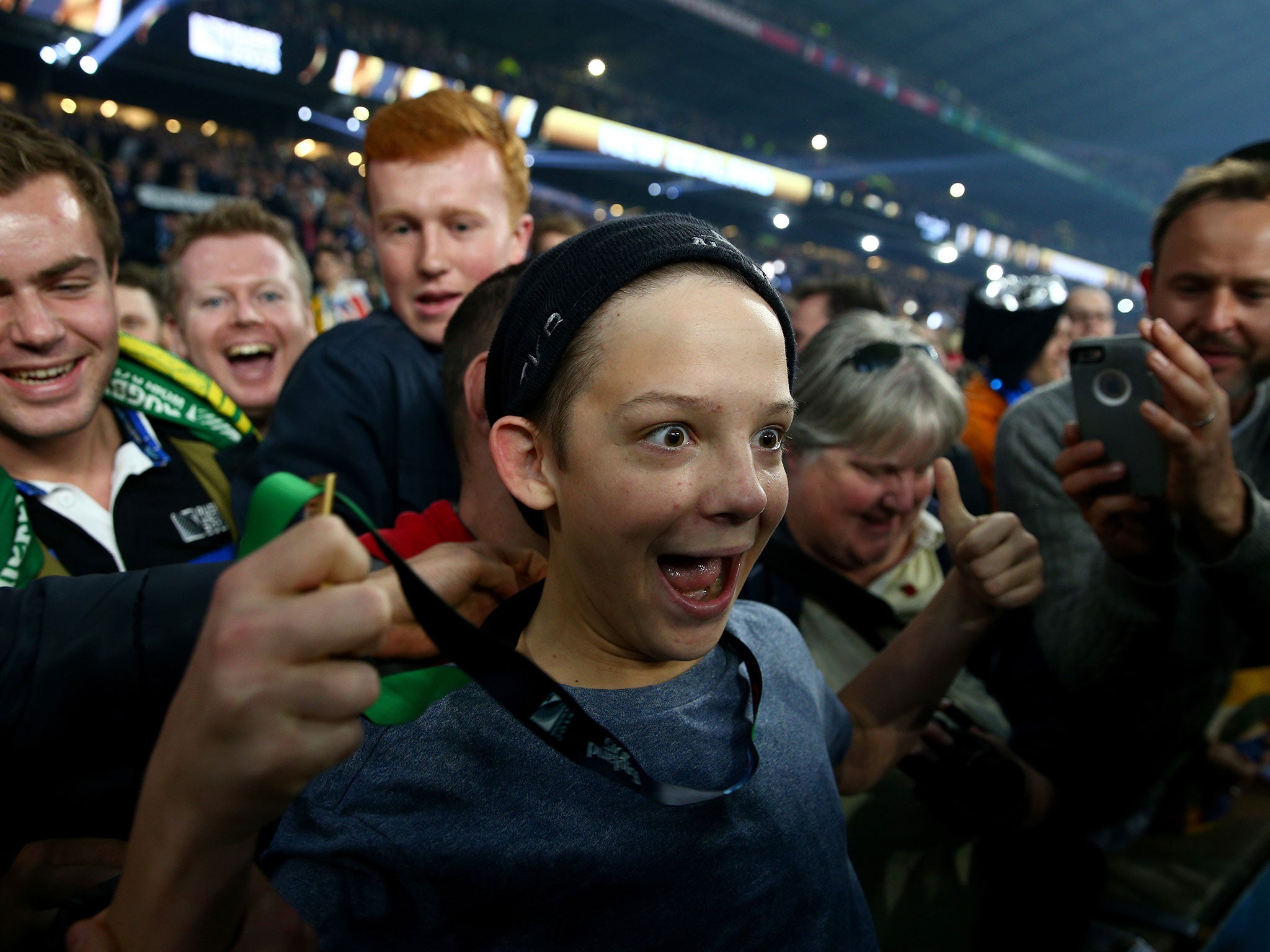 Young rugby fan Charlie Lines can't believe his luck when he receives Williams' medal