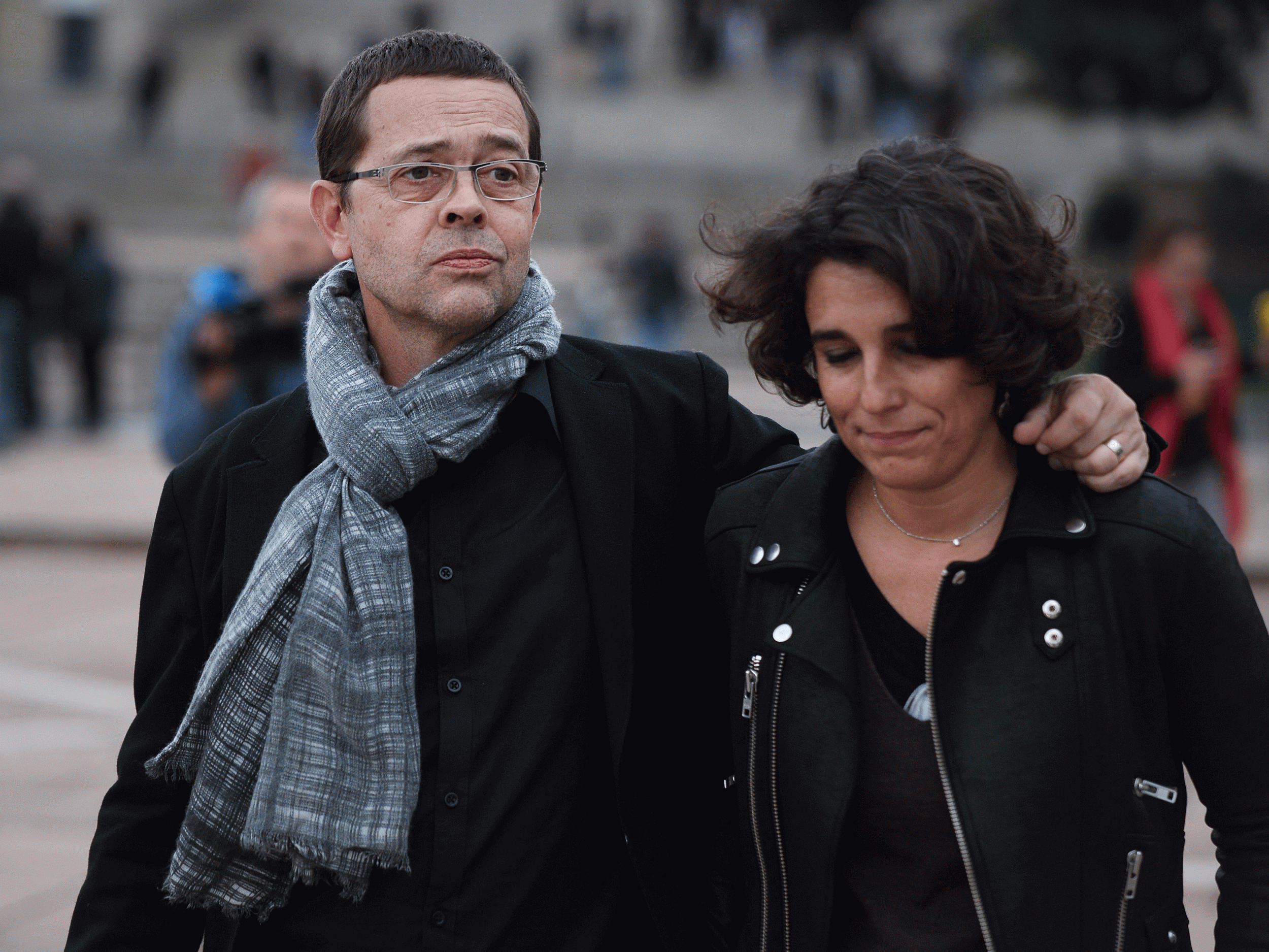 Former French emergency doctor Nicolas Bonnemaison walks with his wife Julie Bonnemaison on October 24 at the end of his trial